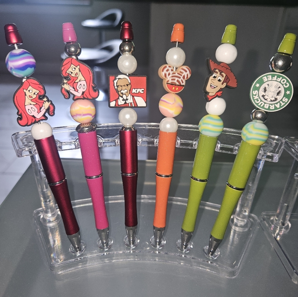 Beautiful  pens with characters on the tips.